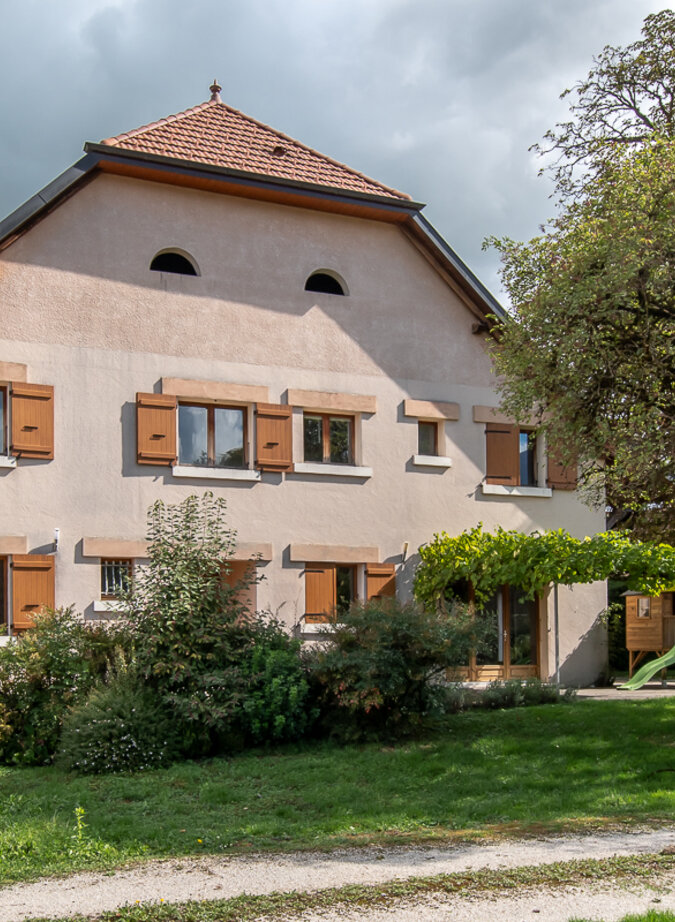 Renovated 19th-century farmhouse with adjoining barn offering great potential.